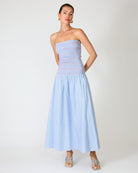 Strapless smocked bodice maxi dress with flowy skirt