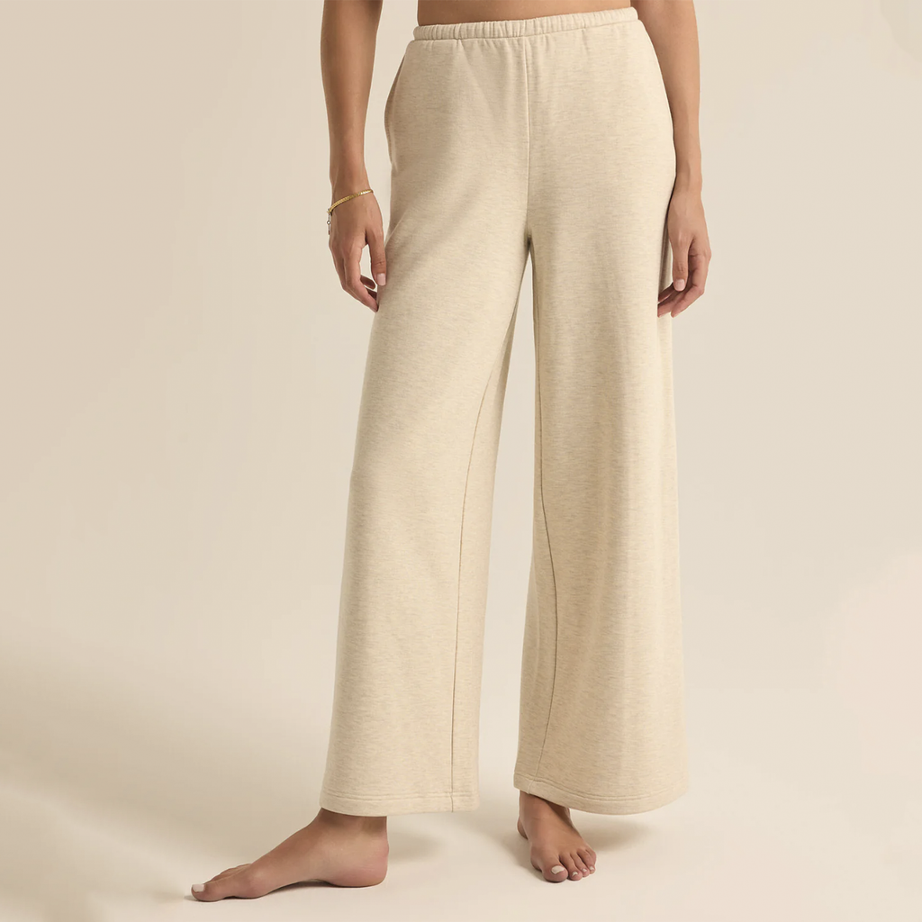 Relax in comfort and style with the Homebody Pant. Designed with a high rise and full length for the perfect fit, it features an elastic waistband and side seam pocket for added convenience. The midweight fabric provides a regular, cozy fit that's perfect for lounging. Ideal for those laid-back days at home (or whenever you just feel like staying in). Complete the set by pairing it with our Homebody V-Neck Long Sleeve Top for the ultimate chill look.