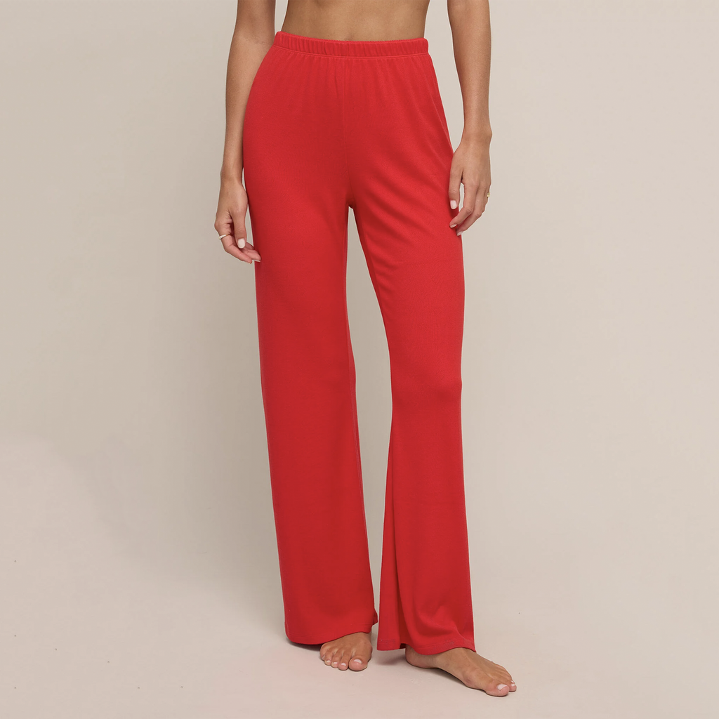 Get ready to cozy up in style with the Sabrina Pointelle Pant. Crafted from ultra-soft, silky pointelle fabric, these pants feature an elastic waistband, playful heart details, and a relaxed fit with full-length straight legs. Pair it with the Camille Pointelle Cami for the ultimate chill-out combo!