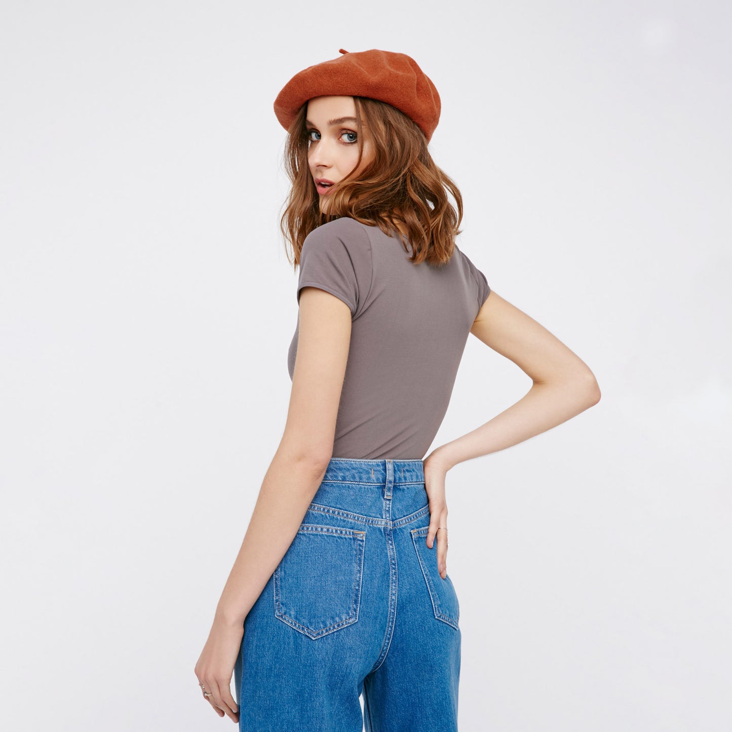 Free People Cap Sleeve Crop Top. A solid design lends versatile appeal to this cropped top by Free People. This basic crop top features a pullover style, crew neck, and short cap sleeves. Wear this with almost any bottom and sandals for a chic look.