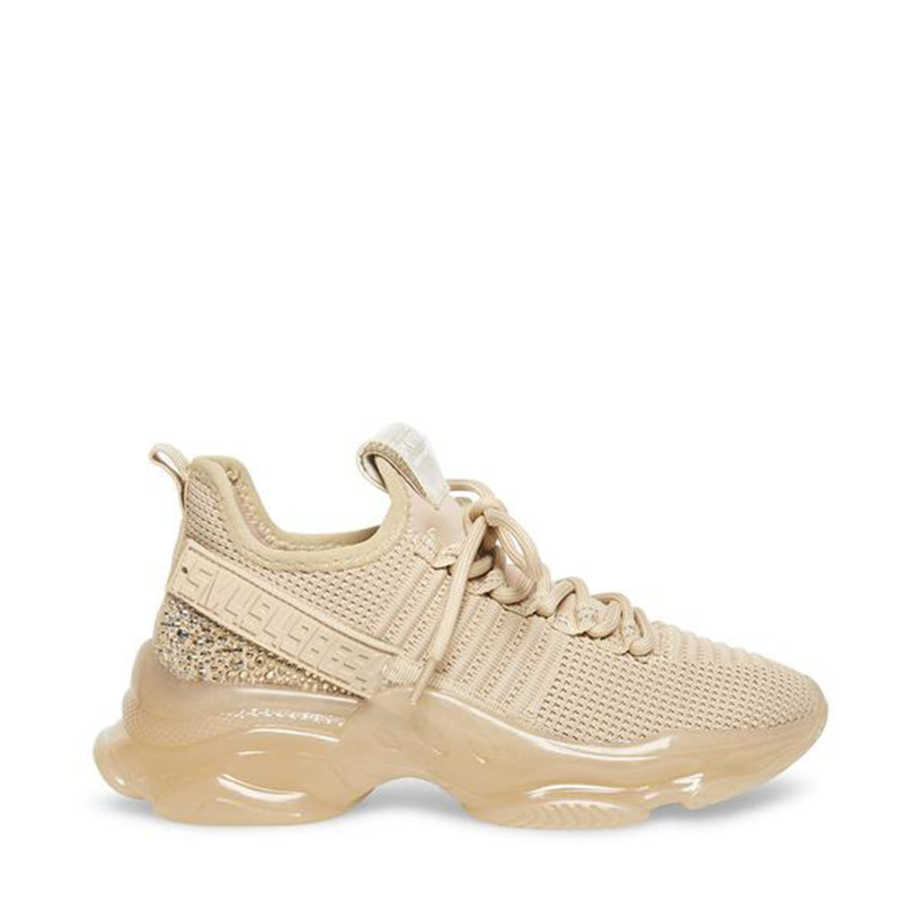 Steve Madden Maxima Sneaker. If you only rock one sneaker this season, make it the MAXIMA. A super-sleek monochromatic color palette unites this kick’s defining features, which range from a texture-blocked knit upper to an artfully sculpted sole and glitzy rhinestone embellishment. 