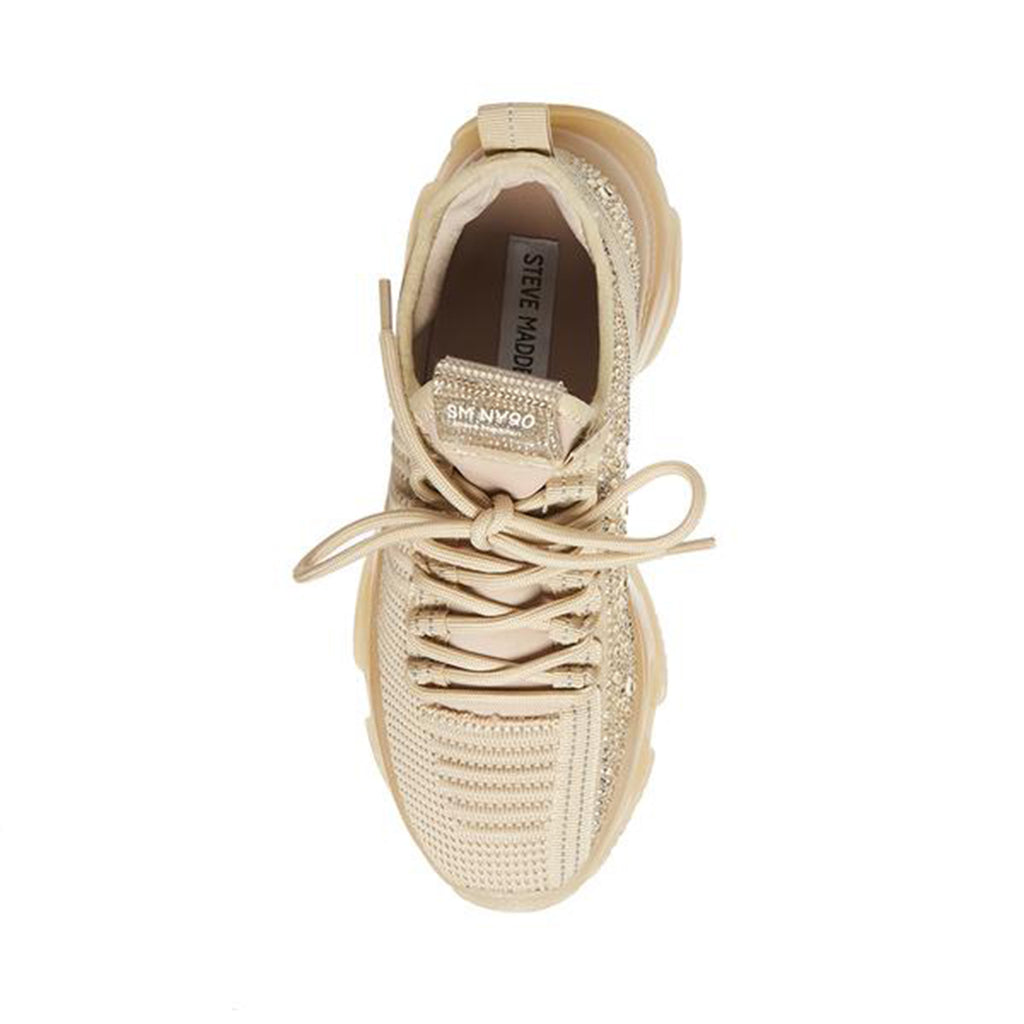 Steve Madden Maxima Sneaker. If you only rock one sneaker this season, make it the MAXIMA. A super-sleek monochromatic color palette unites this kick’s defining features, which range from a texture-blocked knit upper to an artfully sculpted sole and glitzy rhinestone embellishment. 