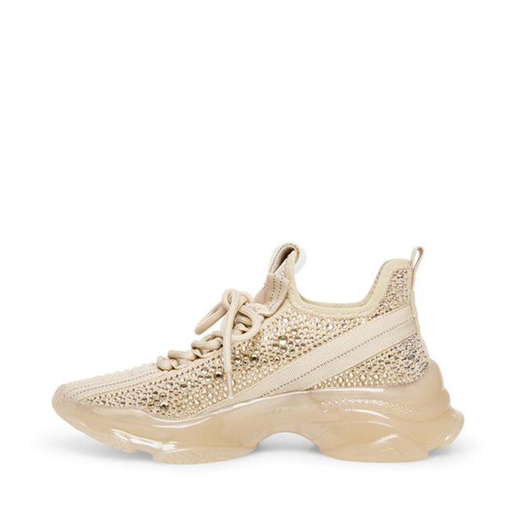 Steve Madden Maxima Sneaker. If you only rock one sneaker this season, make it the MAXIMA. A super-sleek monochromatic color palette unites this kick’s defining features, which range from a texture-blocked knit upper to an artfully sculpted sole and glitzy rhinestone embellishment. 