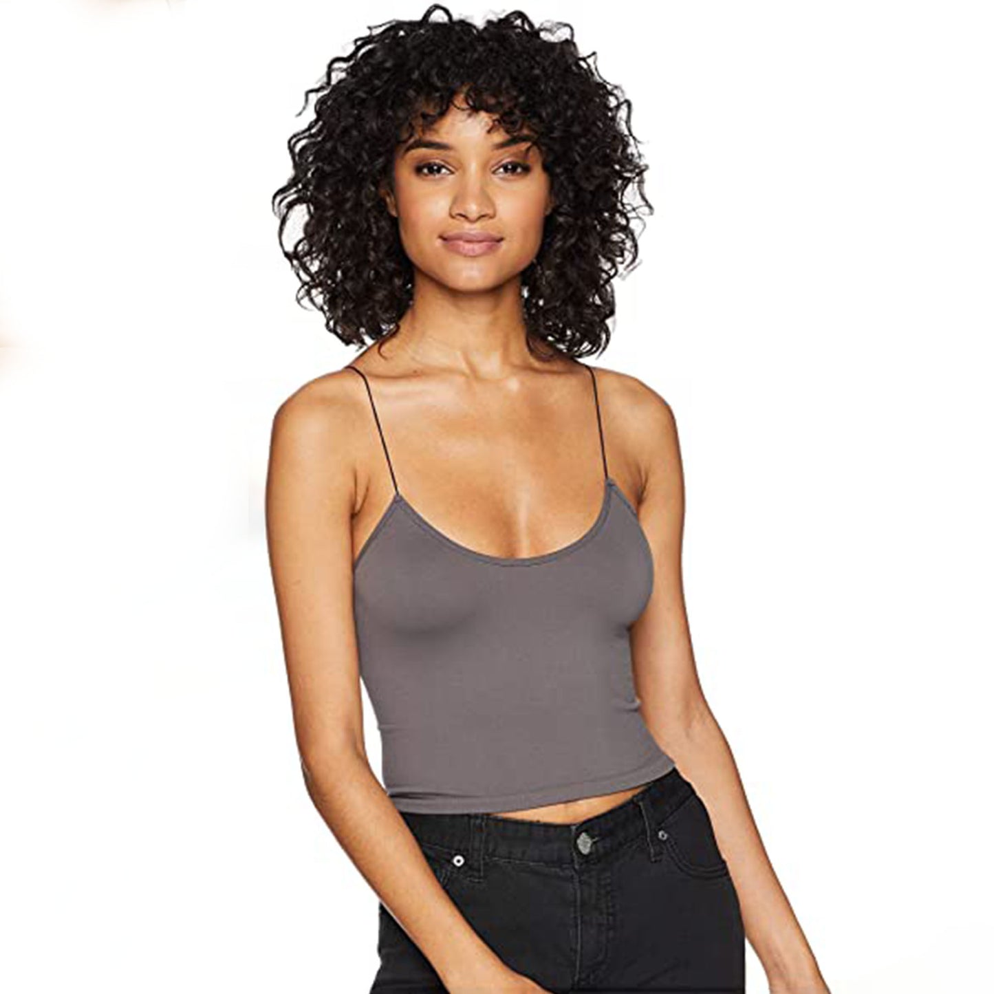 Free People Skinny Strap Brami. American made from our Signature Seamless fabric, this stretchy brami features elastic straps and a ribbed hem. The perfect little tank for lounging or hanging out with friends, this top is essential!