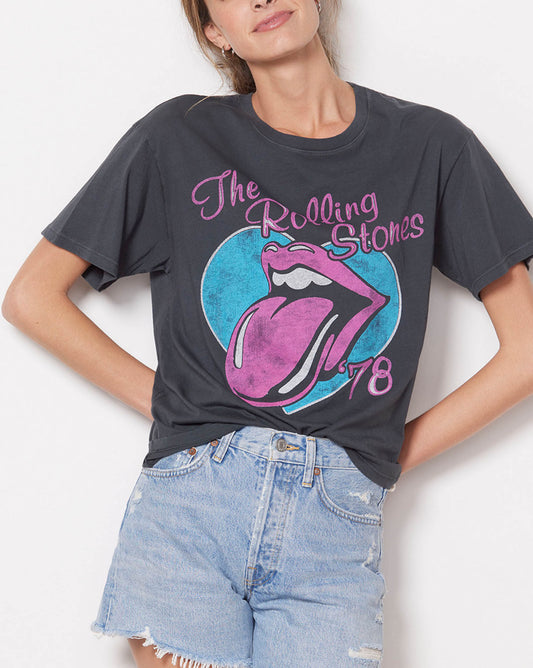 Day Dreamer Rolling Stones 78 Ticket BF Tee Add some rock and roll to your look with this Rolling Stones tee by Daydreamer! This soft cotton tee features a classic crewneck and graphics on the front and back. Pair with any jeans, joggers, or leggings for a a cute and casual vibe.