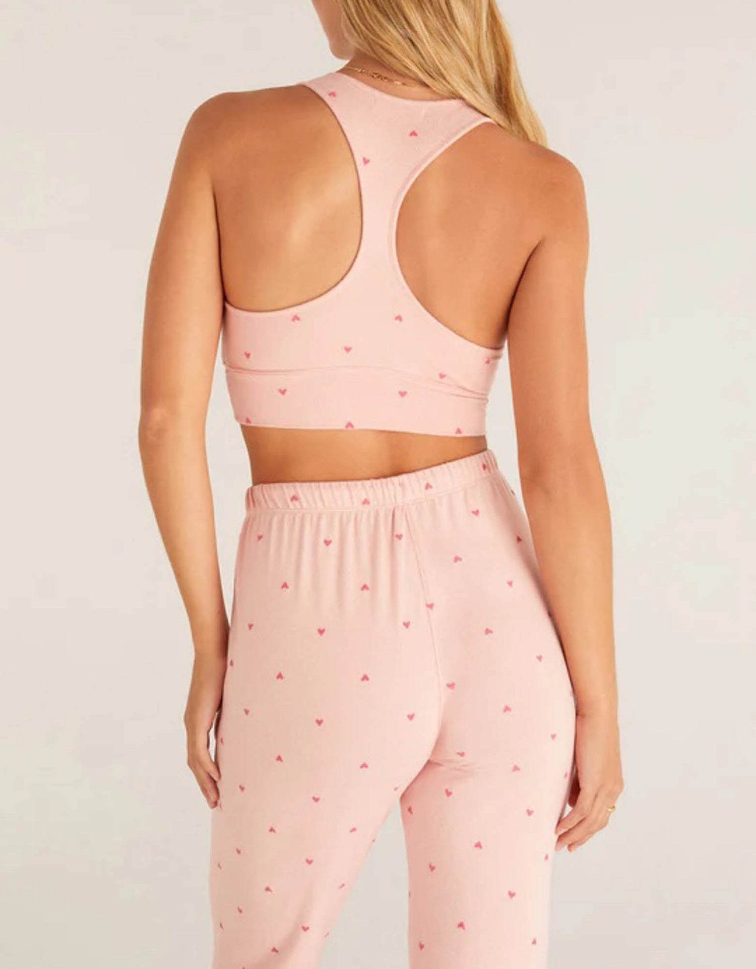 Z Supply Sia Heart Tank Bra This heart tank bra will keep you looking cute and cozy all night long, made with irresistibly soft silky jersey fabric and featuring a slim fit and flattering neckline pair it with your favorite joggers or shorts to finish the look!