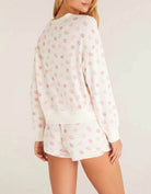 Z Supply Elle Lip Top This lips top is so soft and comfy, featuring an adorable all over kiss print with rib details it's perfect with a pair of matching shorts or joggers!