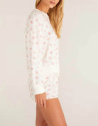 Z Supply Elle Lip Top This lips top is so soft and comfy, featuring an adorable all over kiss print with rib details it's perfect with a pair of matching shorts or joggers!