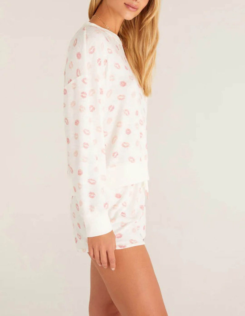 Z Supply Elle Lip Top This lips top is so soft and comfy, featuring an adorable all over kiss print with rib details it's perfect with a pair of matching shorts or joggers!