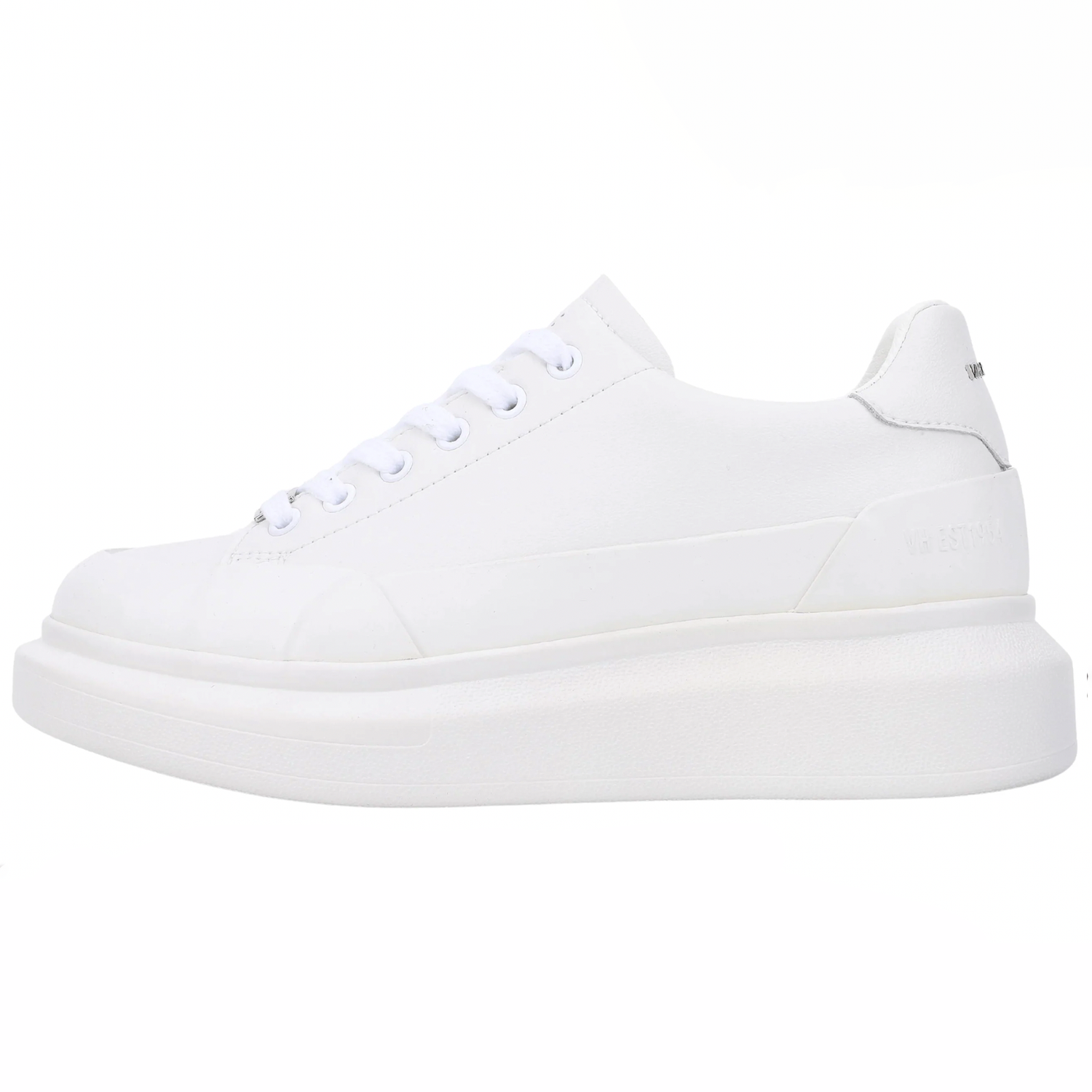Vintage Havana Angela Sneaker. This sneaker is a must-have this season! The all white shoe is perfect to pair with literally any outfit. The shoe features a low-profile, round toe, and a textile upper