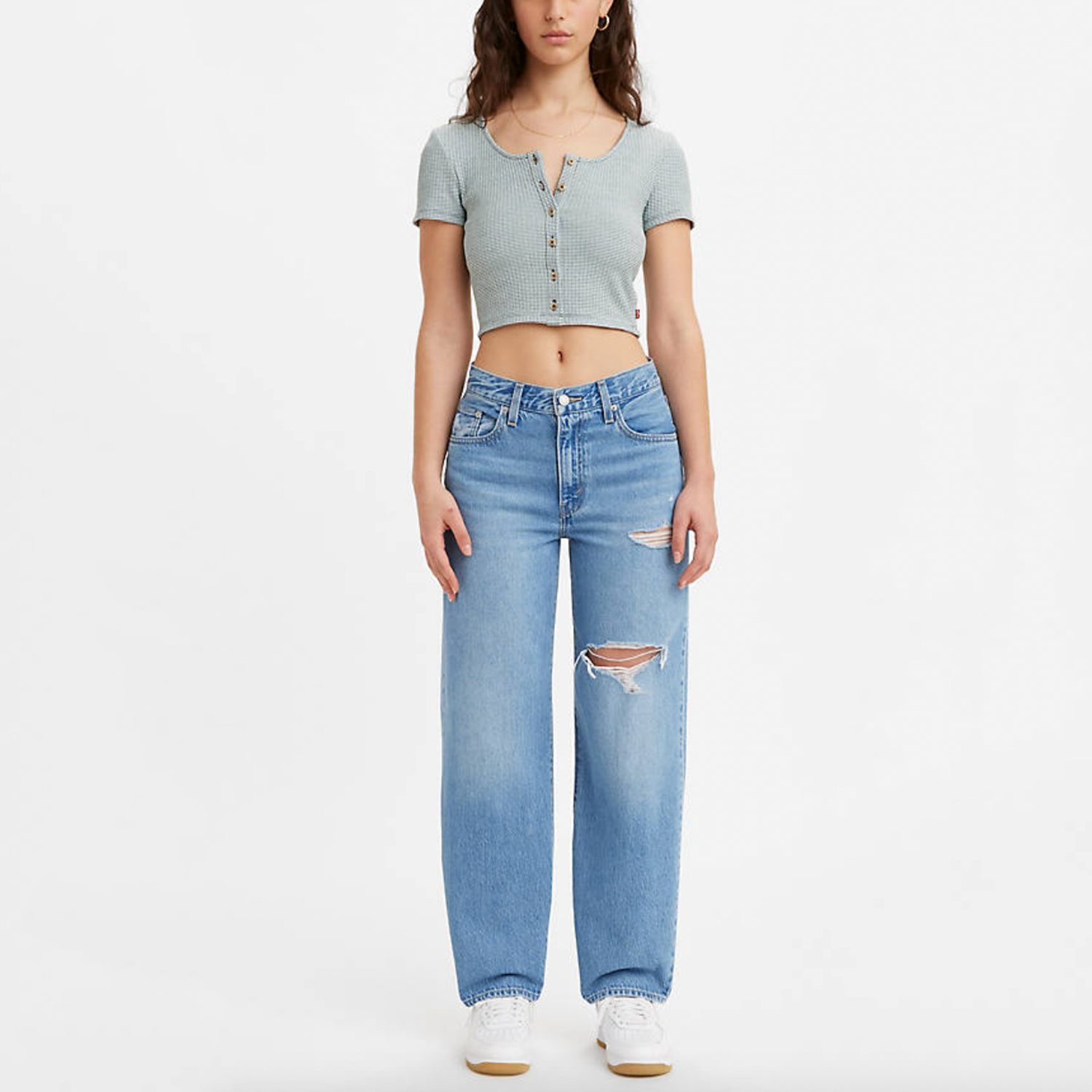 Levi's Baggy Dad Jean. The kind of jean you might steal from your dad's closet but baggier. These jeans have a mid rise and straight leg. This pair is relaxed yet flattering with extra room for a subtle edge. Throw on your favorite kicks for that chill ‘90s look any day of the week