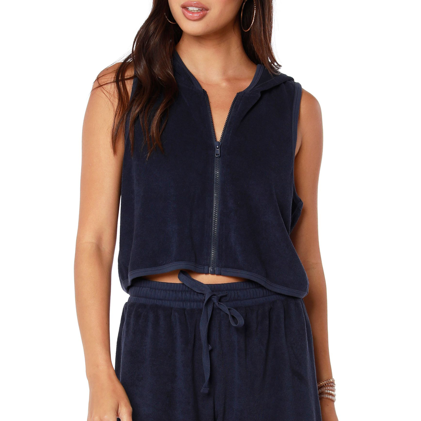 Bobi Hooded Zipper Vest. Perfectly put together. This hooded vest is an artful mix of style and comfortability. Wear on its own or use it as a layering piece for your warm day outfit