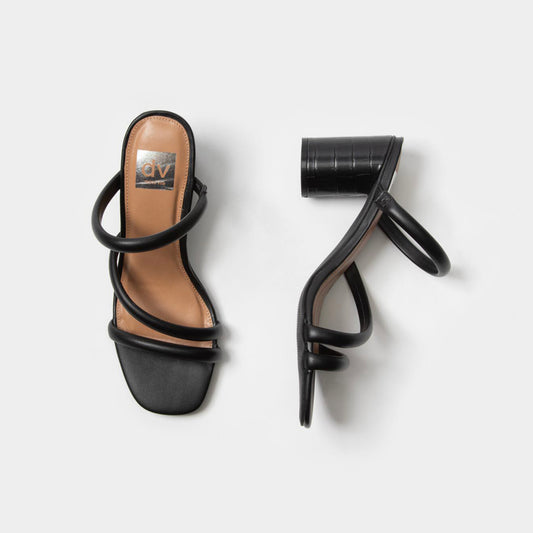 Dolce Vita Myla Heel. Glide on through your day to evening in the Myla Heel. Complete with flirty crisscross straps and a block heel, this sandal will elevate your look for an on-trend style