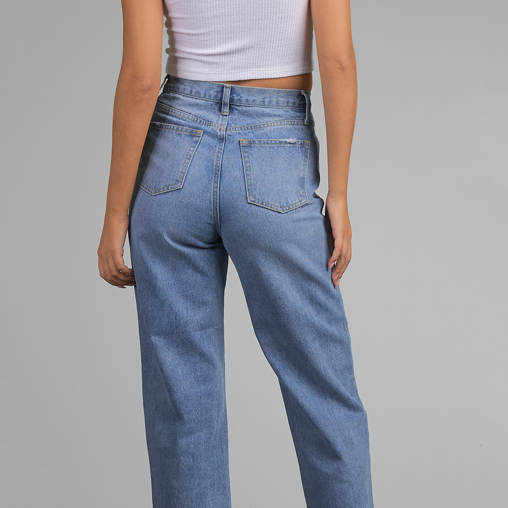 Elan Hi Waist Overlap Jean. These fun jean features an asymmetrical overlap front for a modern edge. Made in a soft all-cotton material, this trendy silhouette has a boyfriend fit and can easily be dressed up or down