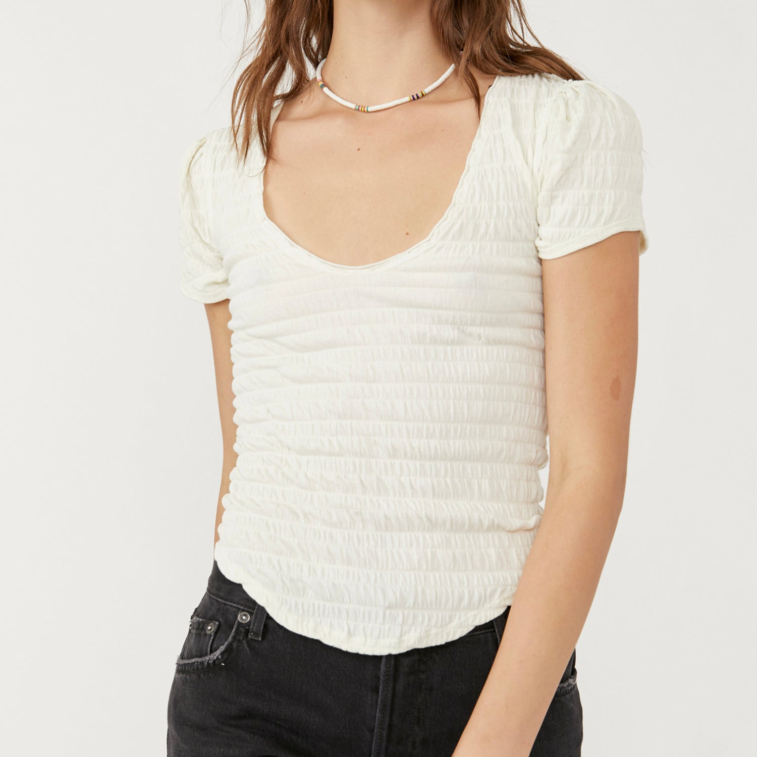 Free People Sugar Cube Tee. Just as special as it is versatile, this top is featured in a boxy, cropped design and stunning lace fabrication with tulle and ruffled sleeves for added dimension