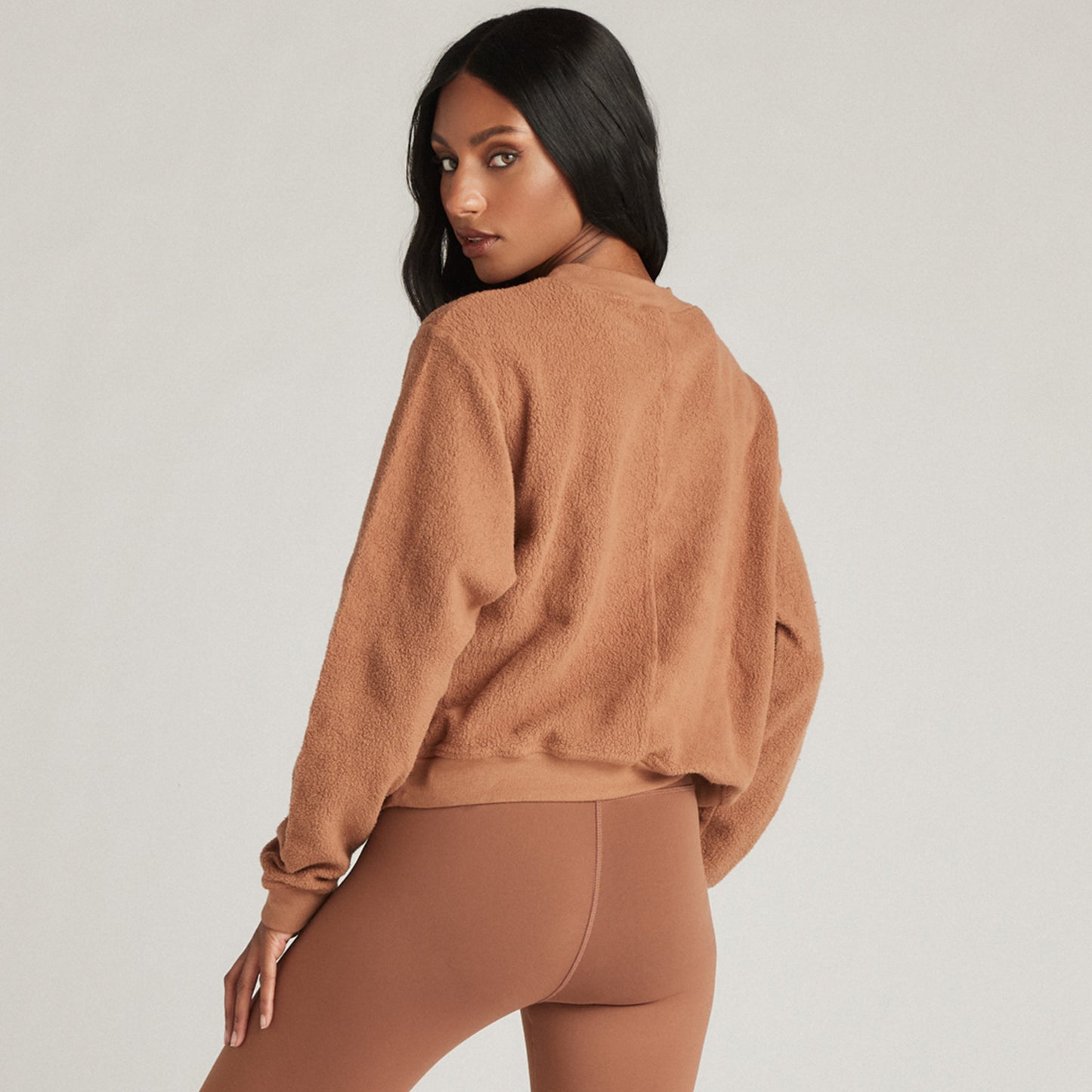Strut This Georgie Sweatshirt. This slightly cropped pullover is a cold-weather essential. Made from ultra-soft fibers and designed with a chic high neck, this sweatshirt will keep you warm and comfortable all season long.