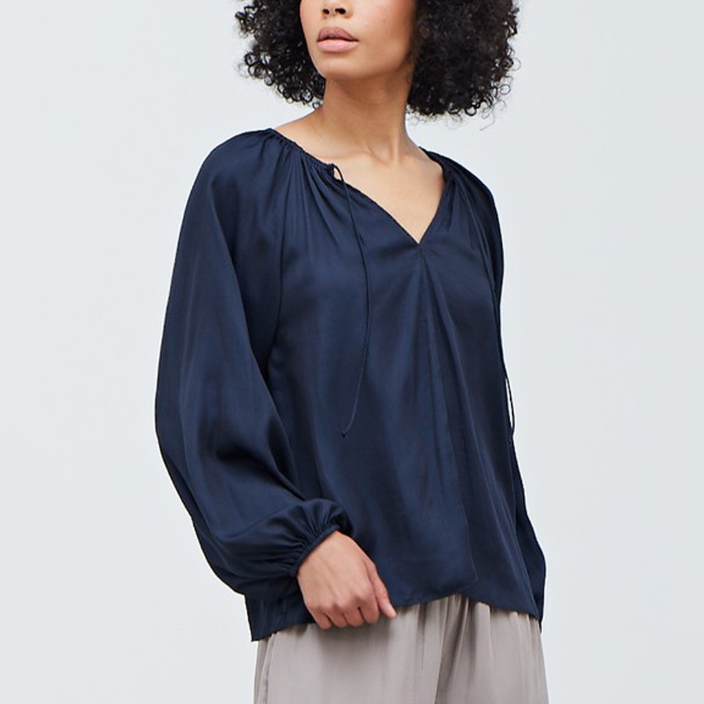 Solid Satin Blouse. Whether you're updating your workwear or looking for a closet staple, this long-sleeve satin button-up checks all the boxes