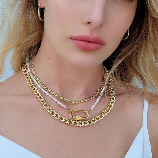 Carabiner Pearl Necklace. Freshwater pearls with 3mm stainless steel accents and a stainless steel carabiner. Open the carabiner and add your favorite charms and pendants for some extra flare