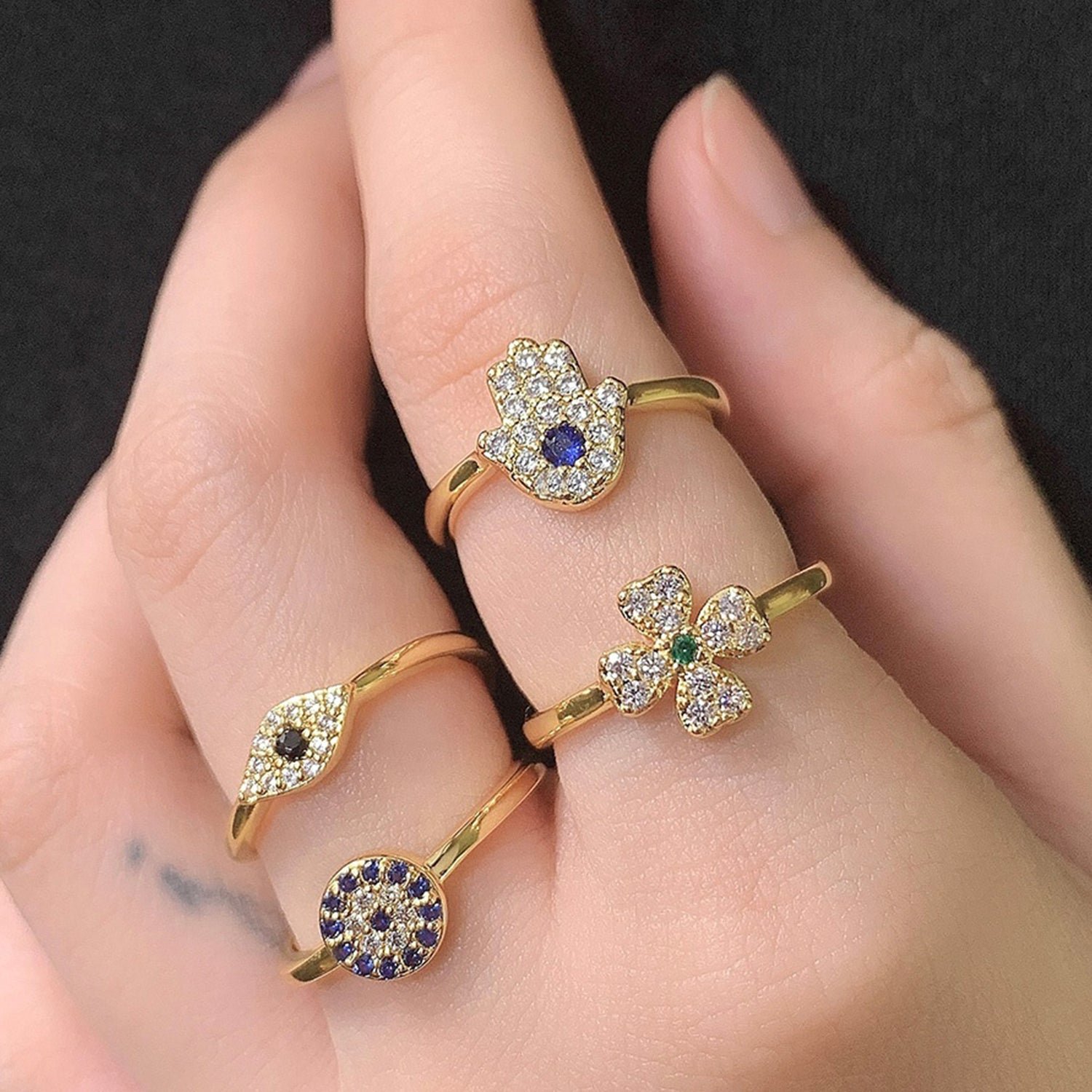 Hamsa Ring. A brilliant blue gem radiates calm from the open palm of this gorgeous hamsa ring. Its slim band makes it a perfect fit for layering when your look calls for maximum flashiness