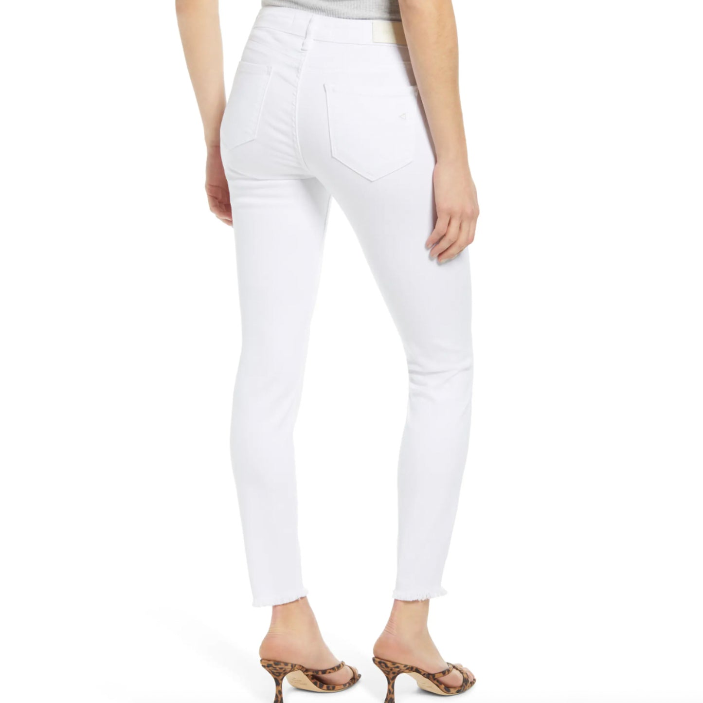Hidden Amelia Mid Rise Frayed Hem Skinny Jeans. Welcome white-jeans season in this stretch-kissed pair of jeans finished with a trendy frayed hem