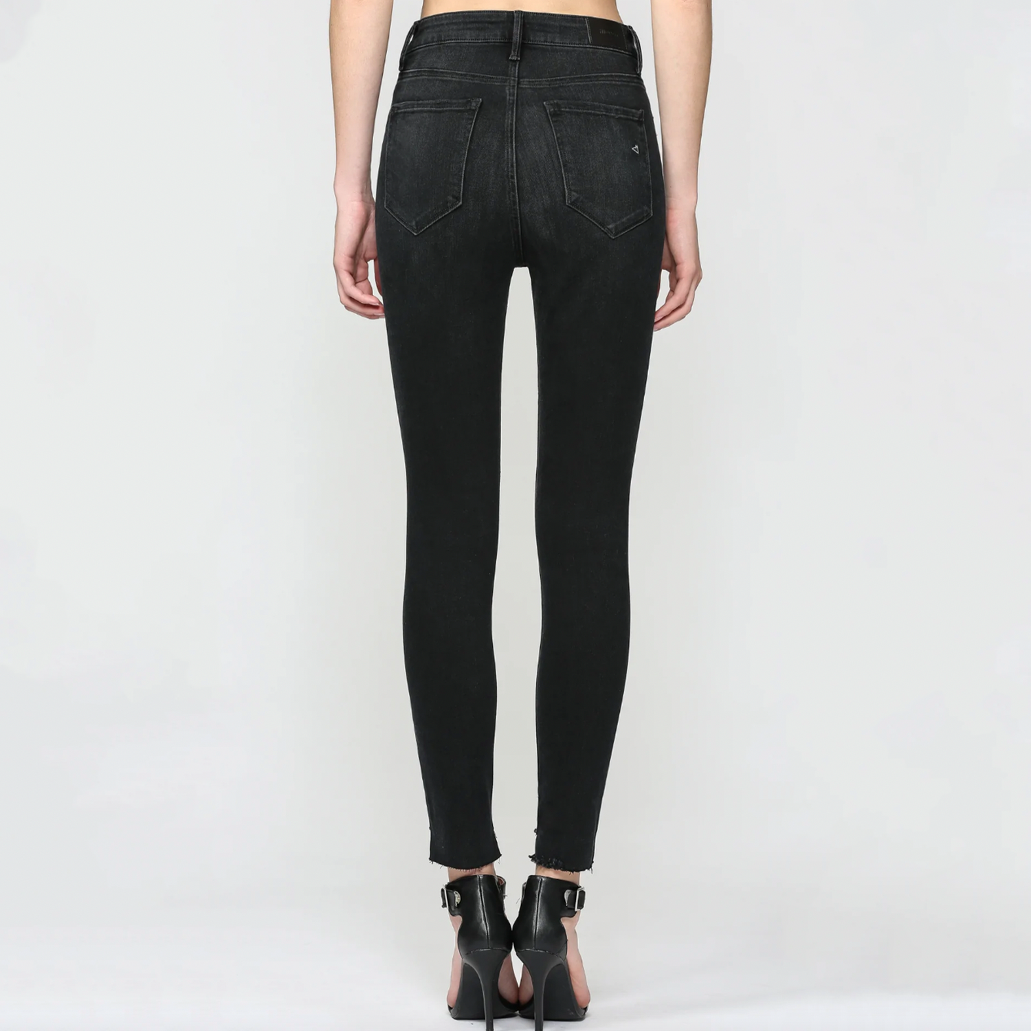 Hidden Taylor High Rise Crop Skinny. Everyone needs a pair of black wash high rise jeans. An addd bonus is the slit knee and step notched hem details. Amazing fit denim with an edgy feel