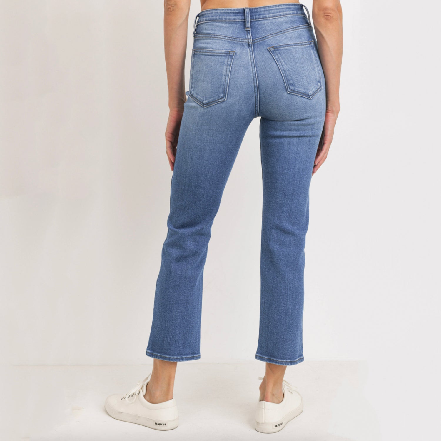 Straight Leg Knee Slit Jeans. A straight-leg, high waisted jean that can go effortlessly from a Monday in the office to Sunday at the farmers market. A medium rinse and subtle knee slits make these jeans a versatile pair that will take you places
