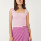 Free People Love Letter Cami. So sweet cami featured in a cropped, square-neck silhouette and jacquard floral design with statement lettuce-edge hemline