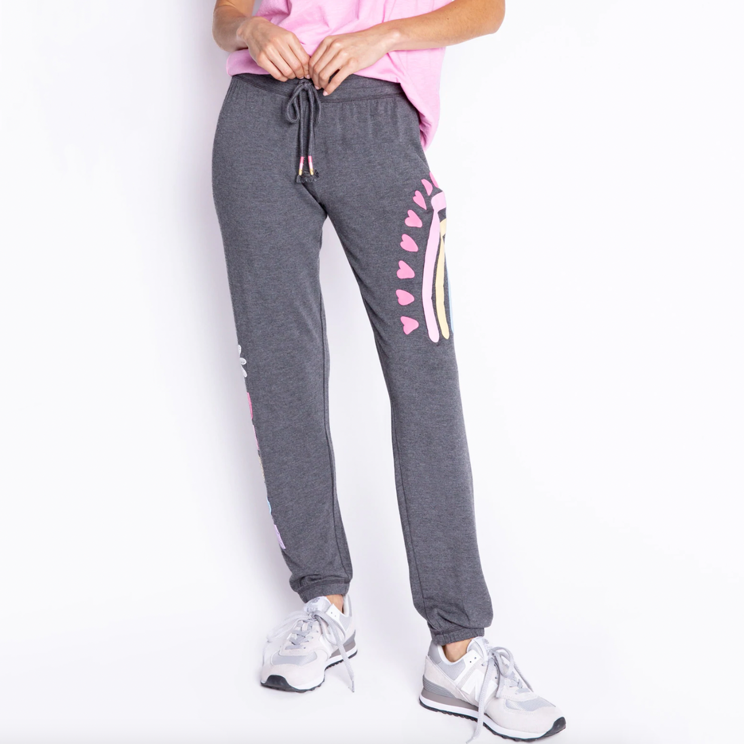 PJ Salvage Peace & Love Banded Pant. Let your good vibes shine! This soft fleece jogger is printed with hearts & peace-signs that make it a statement pant to go with any tee or tank. Designed in the softest fleece, a perfect year-round wear