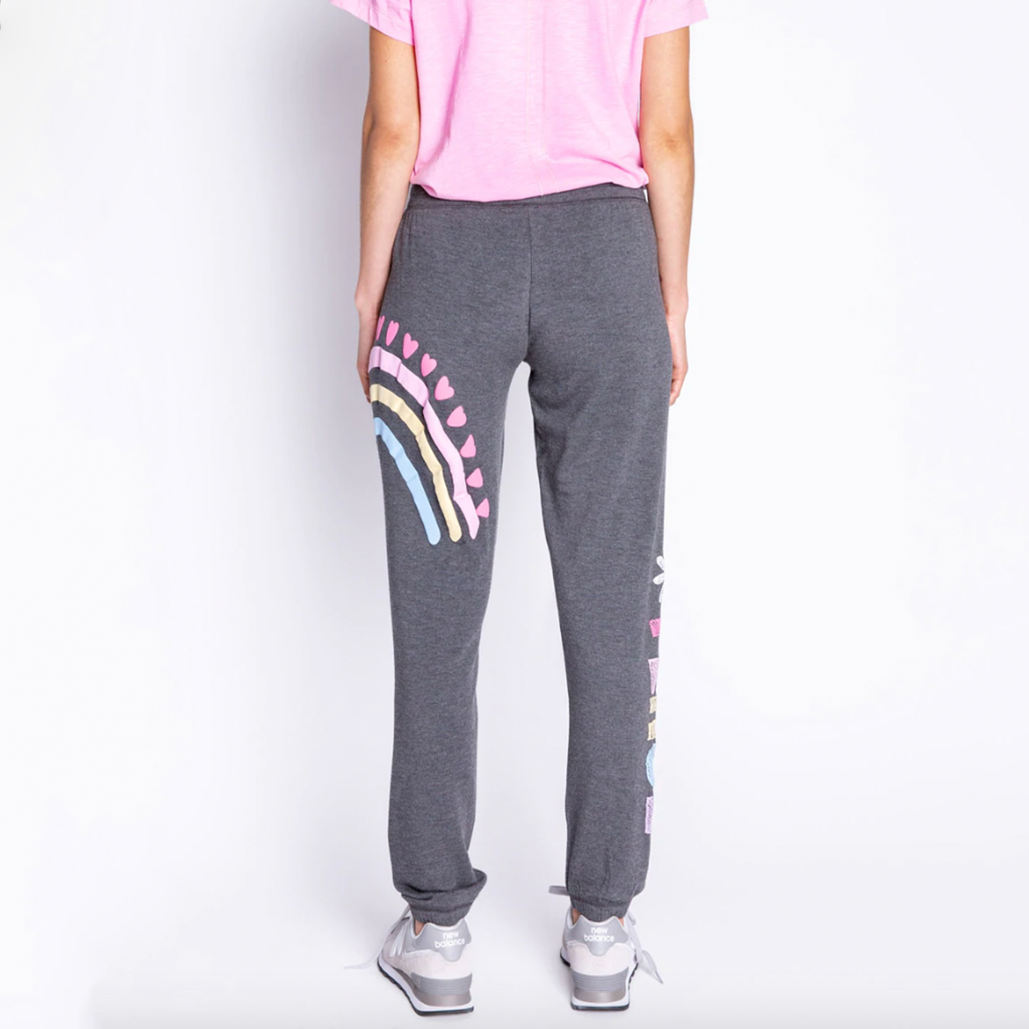 PJ Salvage Peace & Love Banded Pant. Let your good vibes shine! This soft fleece jogger is printed with hearts & peace-signs that make it a statement pant to go with any tee or tank. Designed in the softest fleece, a perfect year-round wear