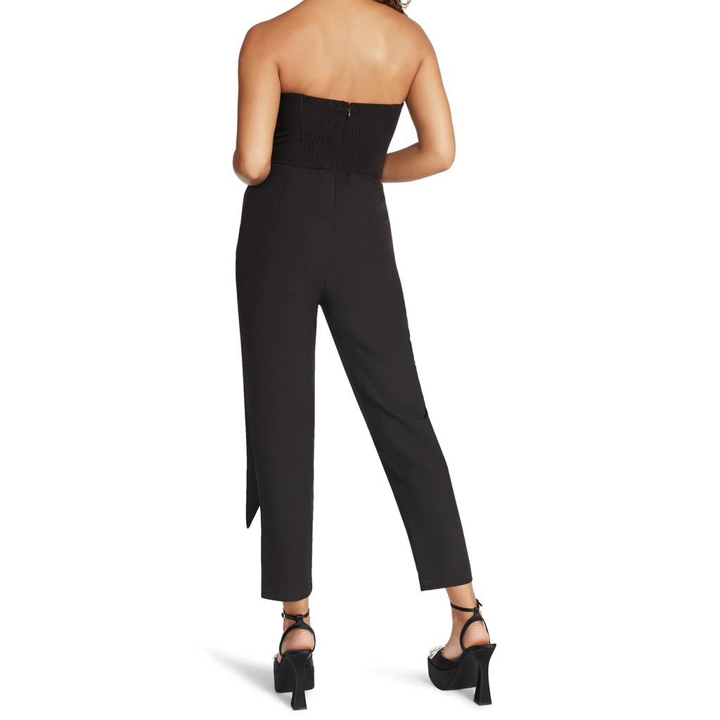 Steve Madden Harlen Jumpsuit. The Harlen jumpsuit is an elegant wardrobe must-have that you need to show off during special occasions. It has a sleeveless top and a belt wrap that beautifully drops on one side
