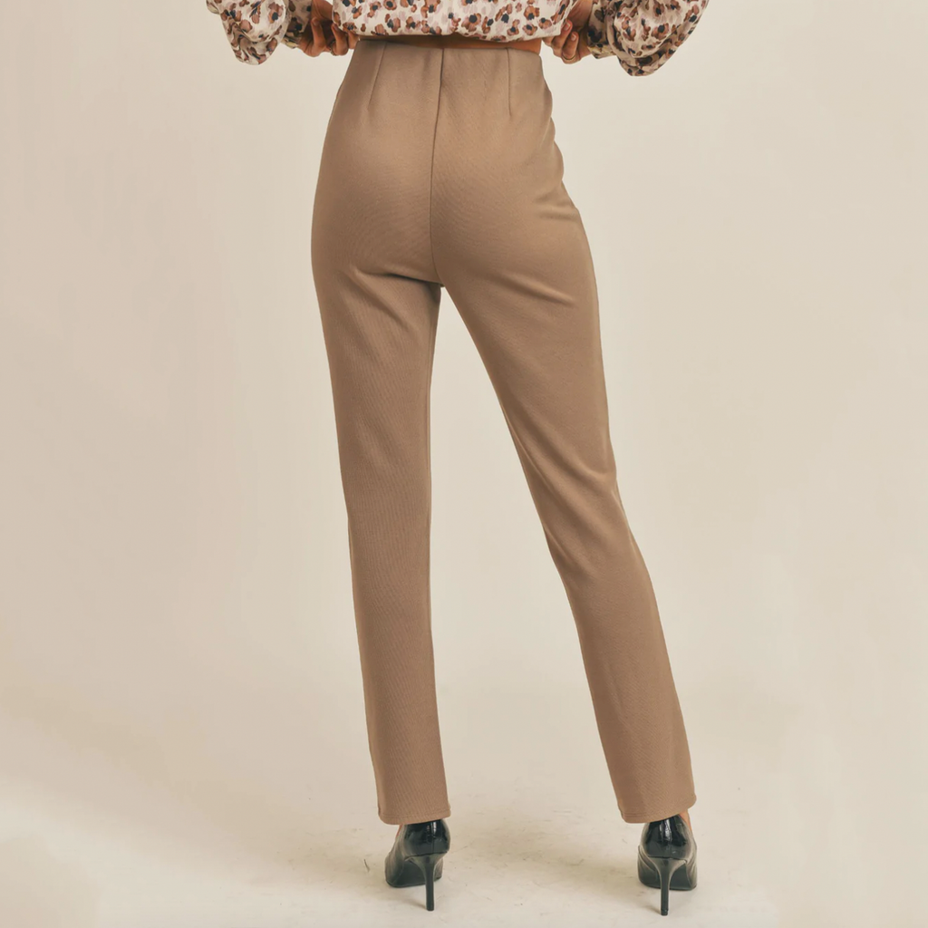 Sage The Label Roundabout Front Slit Pant. These super cute Roundabout Pants feature a split hem with high-waist. Perfect for sprucing up your outfit! 