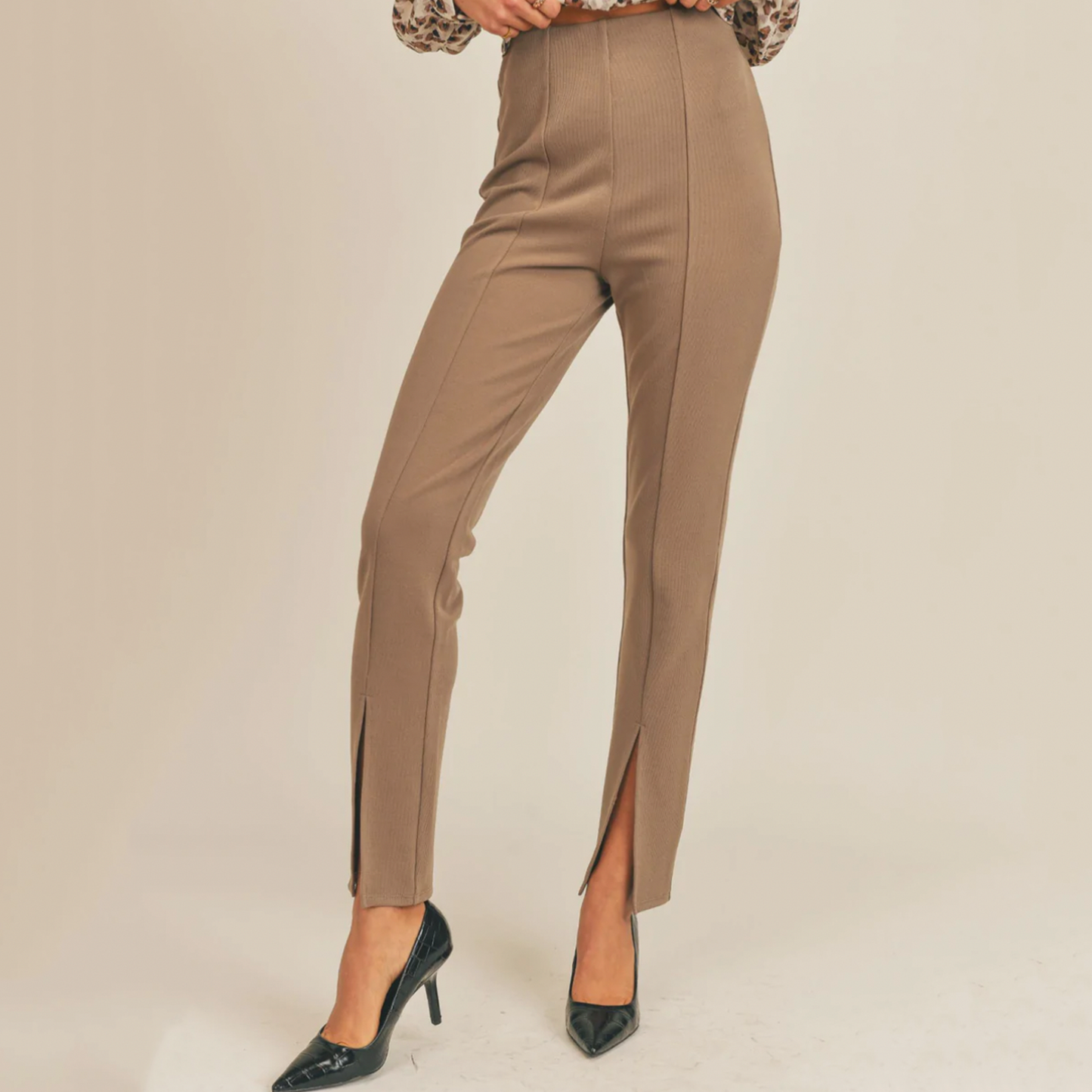 Sage The Label Roundabout Front Slit Pant. These super cute Roundabout Pants feature a split hem with high-waist. Perfect for sprucing up your outfit! 