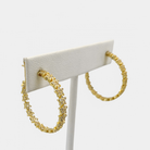 Star Hoops. Star pattern cubic zirconia hoops - cz on outside front and inside back. Slide the earring post into your ears and secure it with the push back backing