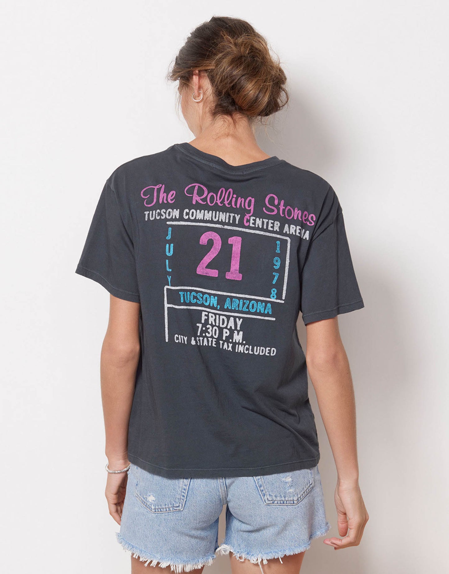 Day Dreamer Rolling Stones 78 Ticket BF Tee Add some rock and roll to your look with this Rolling Stones tee by Daydreamer! This soft cotton tee features a classic crewneck and graphics on the front and back. Pair with any jeans, joggers, or leggings for a a cute and casual vibe.