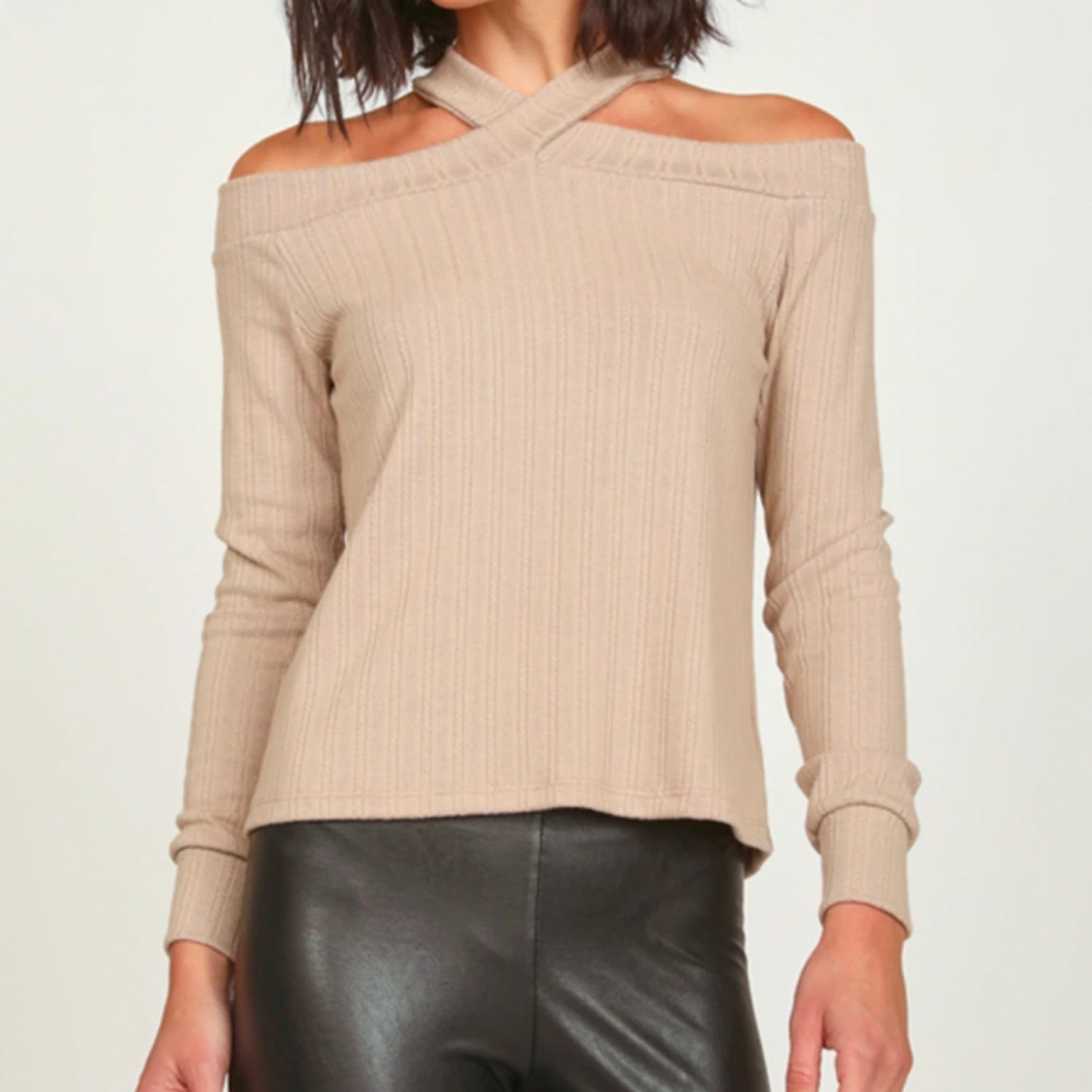 Vintage Havana Cold Shoulder Top. The halter neckline on this top is so flattering for the shoulders. It features a criss cross detail with open shoulders that give off such a feminine look. Pair this top with faux leather leggings and nude booties to add a little pop for a going out look