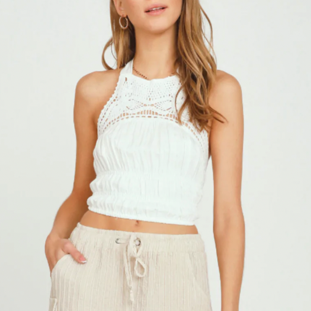 Vintage Havana Crochet Detail Halter Top. The definition of the perfect tank, this halter version features crochet piecing at top and smocked bottom detail with a tie closure to show off your back