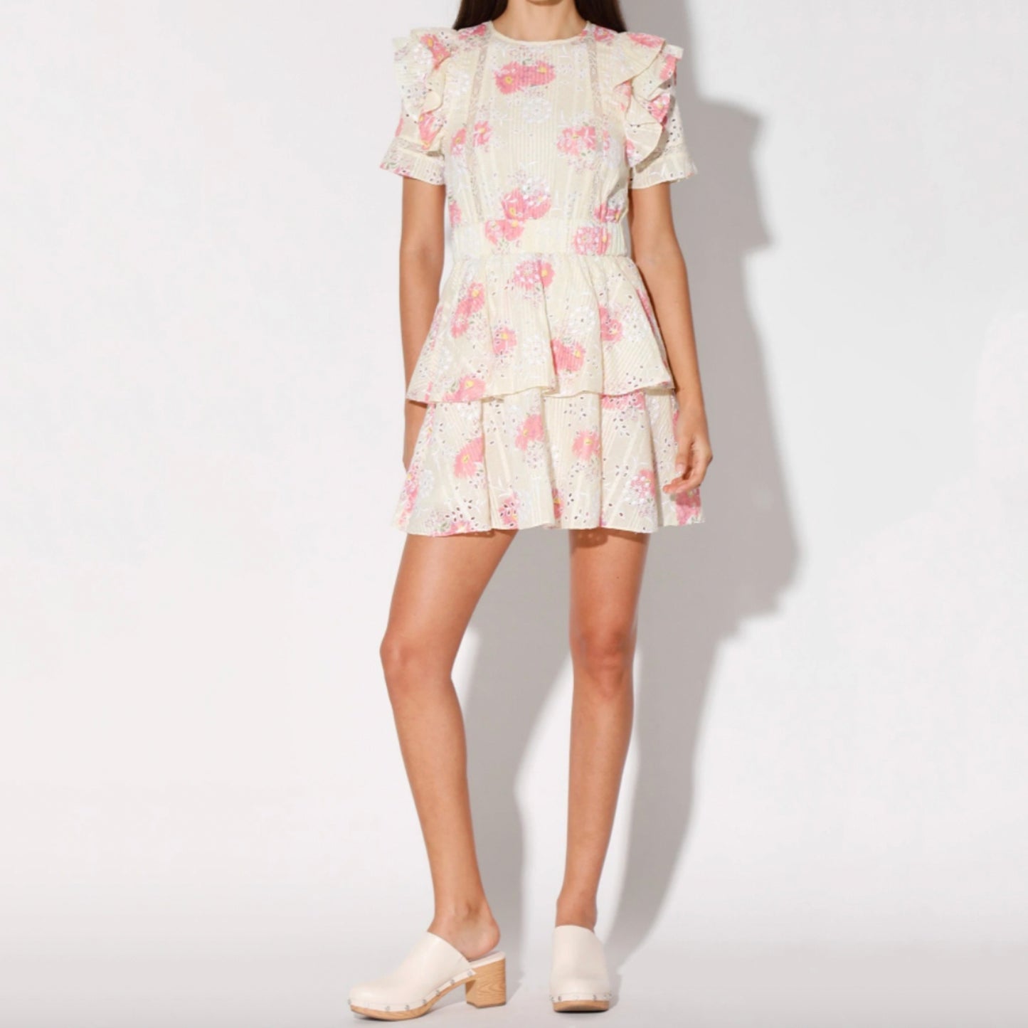 Walter Baker Cassandra Dress. The Cassandra Dress is a pretty perfection with ruffle detail short sleeves and layered flounce skirt! Dress it up with kitten heels or go laid back in sneakers
