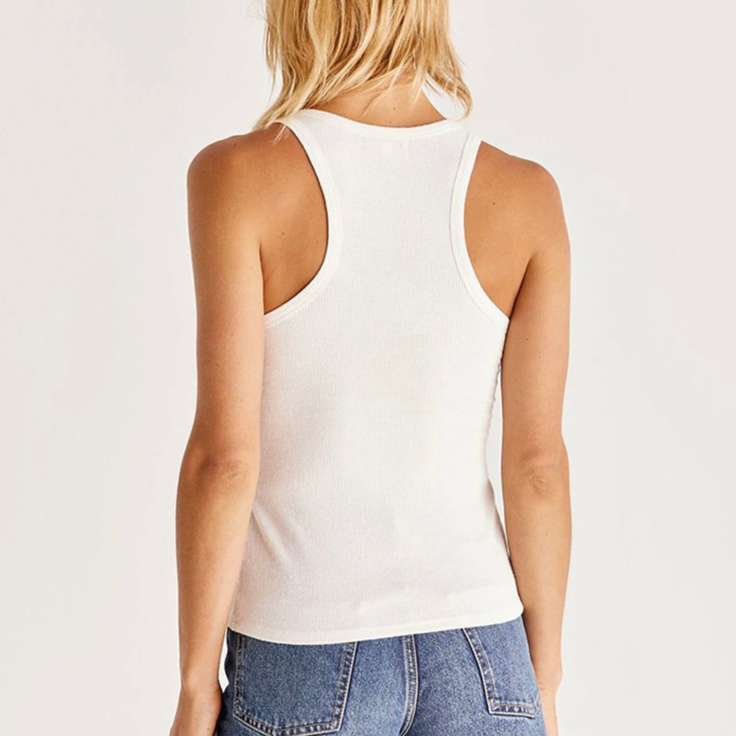 Z Supply Elle Brushed Henley. Update your tank collection with this elevated basic. The tank features a racerback, and henley detail with button closures. This will for sure be a key layering piece for your whole season!