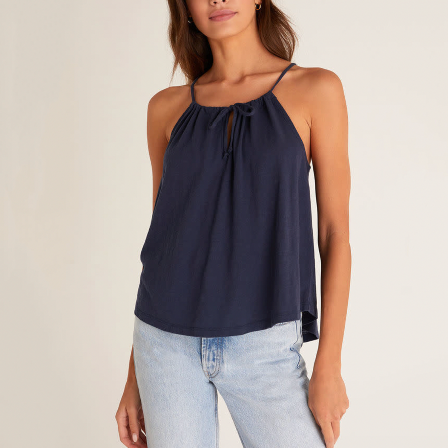 Z Supply Daphne Tank. An iconic summer silhouette, the Daphne Tank takes the spaghetti strap, keyhole look to a new level of comfort. Made using a lightweight fabric, this tank has a relaxed, flowy feel and pairs perfectly with fitted denim or shorts