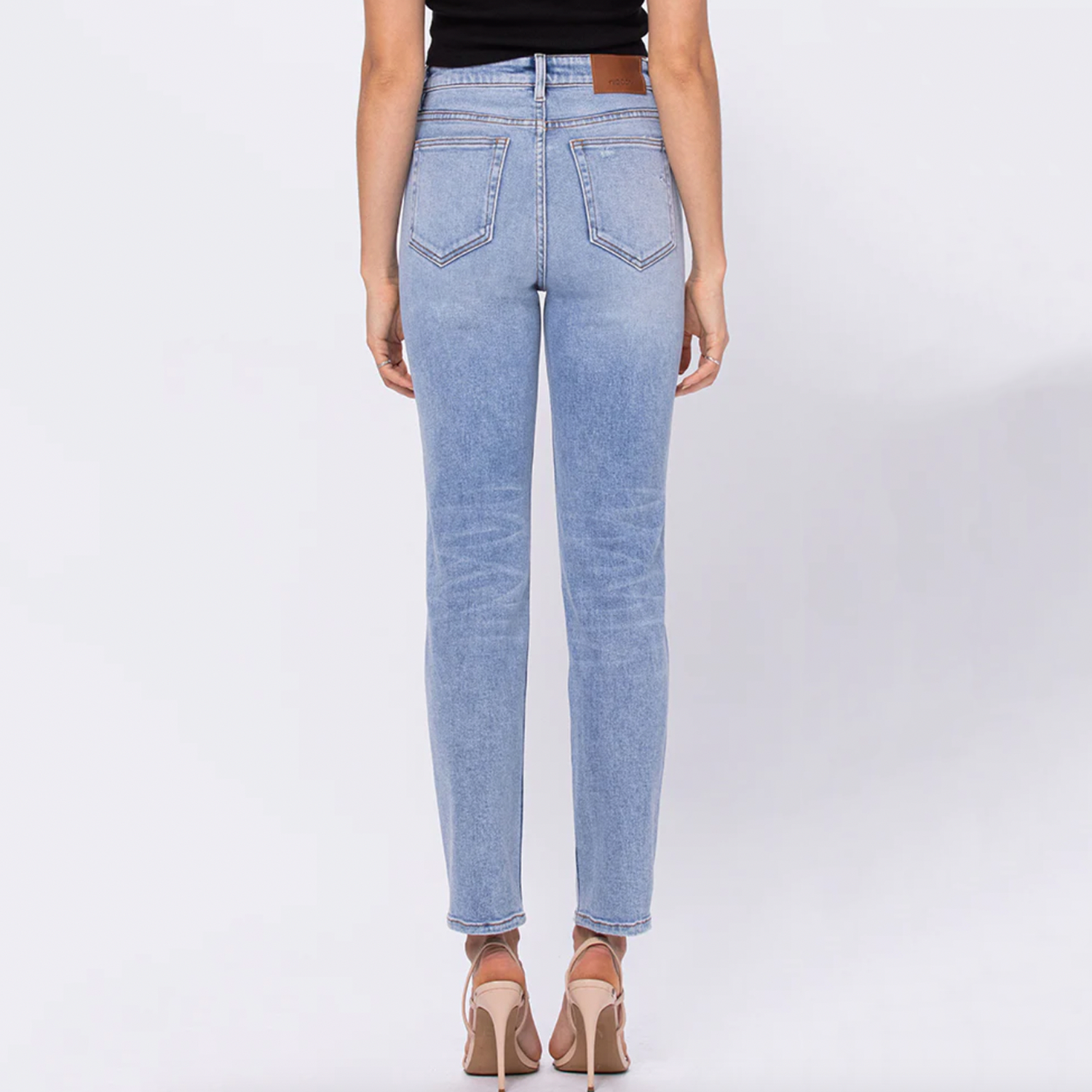 Hidden Zoey Basic Mom Jeans. The jeans everyone is crazy for! A light wash slight distressed denim with button and zipper closet, functioning front and back pockets. Wear these with any tee, sweater, sweatshirt, for an everyday look
