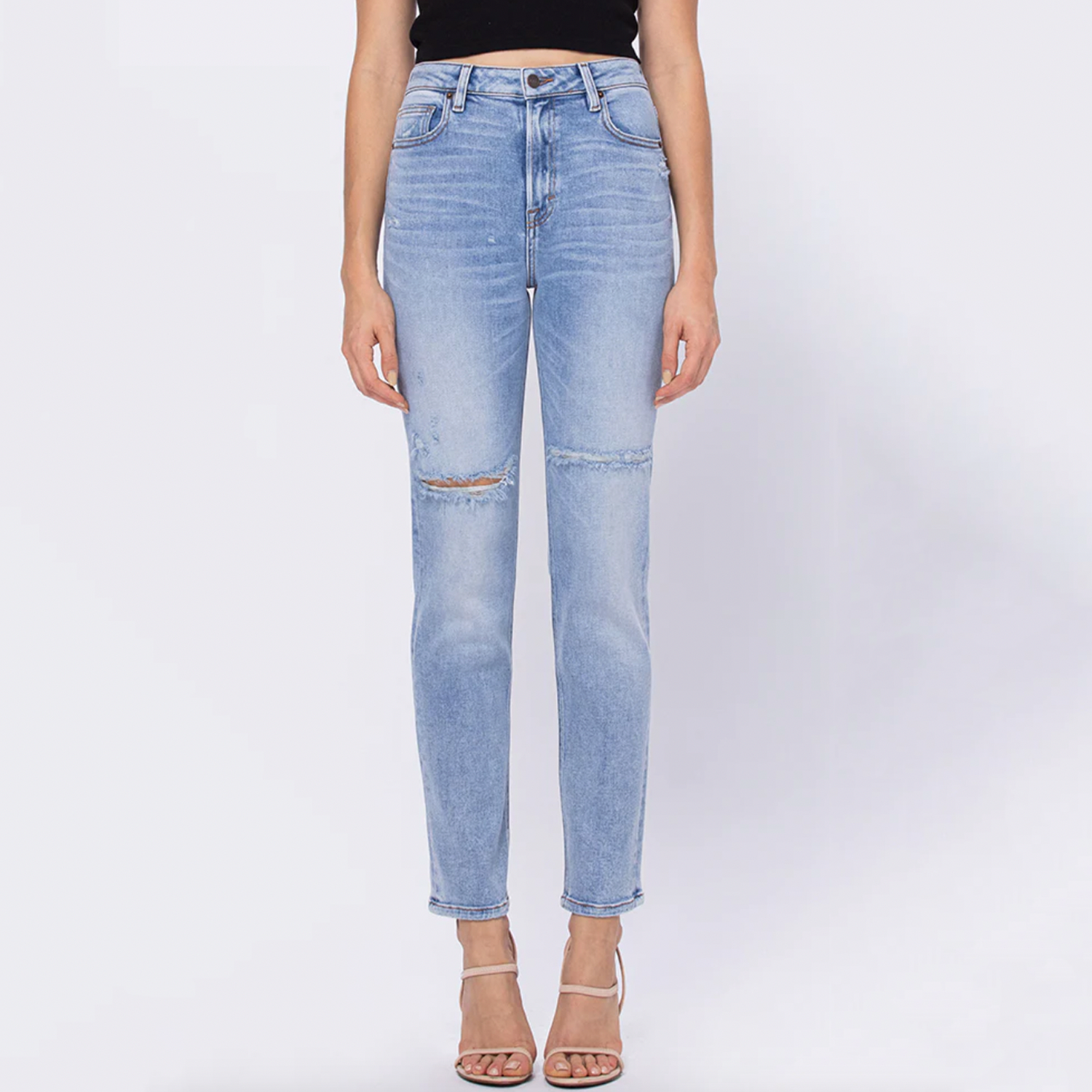 Hidden Zoey Basic Mom Jeans. The jeans everyone is crazy for! A light wash slight distressed denim with button and zipper closet, functioning front and back pockets. Wear these with any tee, sweater, sweatshirt, for an everyday look